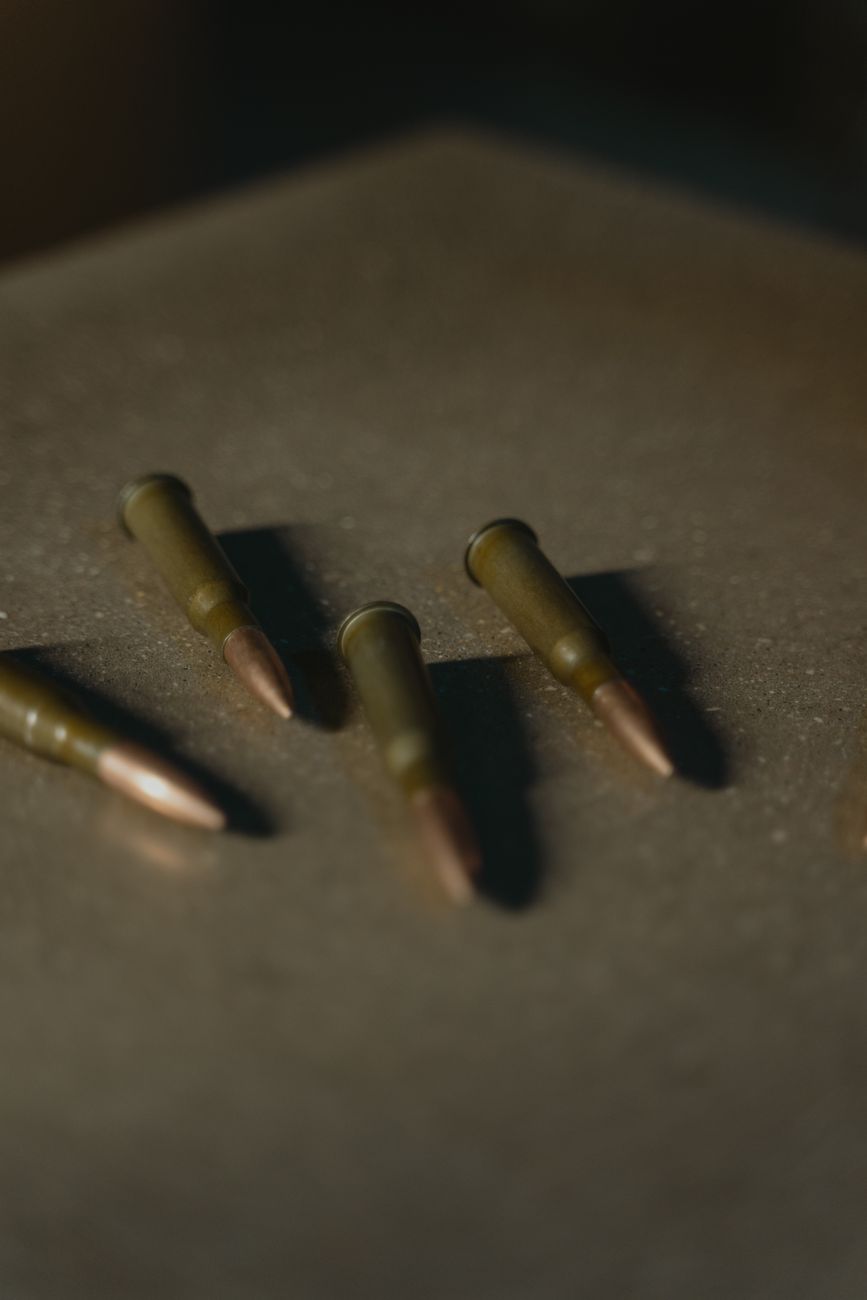cartridges on gray surface